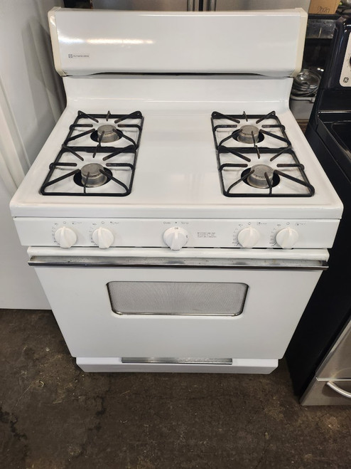 AMERICANA  30 INCH FREE STANDING GAS RANGE PILOT SYSTEM  4 BURNER MANUAL CLEAN OVEN LOWER BOTTOM BROILER WHITE LOCATED