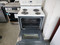 WHIRLPOOL 30 INCH FREE STANDING COIL TOP ELECTRIC RANGE 4 BURNER 2 LARGE 2 SMALL KEEP WARM OPTION SELF CLEANING OVEN WHITE LOCATED IN OUR PORTLAND OREGON APPLIANCE STORE SKU 17325