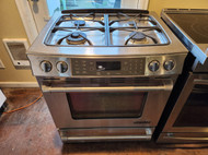 JENN-AIR 30 INCH SLIDE IN GAS RANGE 4 BURNER CONVECTION SELF CLEANING OVEN WARMING DRAWER STAINLESS LOCATED IN OUR PORTLAND OREGON APPLIANCE STORE SKU 17392