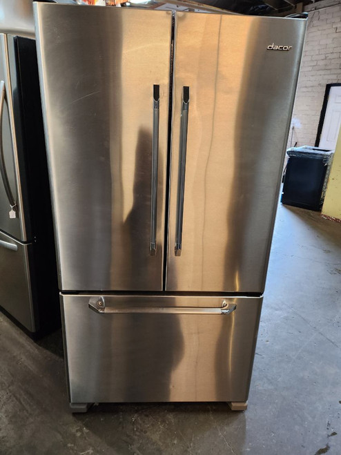 DACOR 20 CUBIC FOOT COUNTER DEPTH FRENCH DOOR REFRIGERATOR BOTTOM REEZER INTERNAL WATER DISPENSER WITH ICE MAKER GLASS SHELVES 1 DELI DRAWER 2 CRISPER DRAWERS PULL OUT FREEZER DOOR STAINLESS LOCATED IN OUR PORTLAND OREGON APPLIANCE STORE SKU 17497