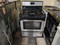 FRIGIDAIRE 30 INCH  FREE STANDING GAS  MANUAL CLEAN OVEN 4 BURNERS STORAGE DRAWER BLACK AND STAINLESS LOCATED IN OUR PORTLAND OREGON APPLIANCE STORE SKU 17420