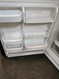 KITCHENAID 22 CUBIC FOOT REFRIGERATOR TOP FREEZER ADJUSTABLE GLASS SHELVES 2 CRISPER DRAWERS WITH GLASS COVER 1 MEAT KEEPER PAN WIRE SHELF IN FREEZER WITH PULL OUT TRAY WHITE  LOCATED IN OUR PORTLAND OREGON APPLIANCE STORE SKU 17568