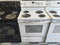 WHIRLPOOL ELECTRIC RANGE 30 INCH FREE STANDING COIL BURNERS 2 LARGE 2 SMALL SELF CLEANING OVEN KEEP WARM OPTION STORAGE DRAWER WHITE LOCATED IN OUR PORTLAND OREGON APPLIANCE STORE SKU 17702