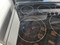 FRIGIDAIRE 30 INCH FREE STANDING SMOOTH TOP ELECTRIC RANGE 5 BURNER 1 LARGE DUAL 1 LARGE CENTER WARMING BURNER 2 SMALL STEAM CLEAN OVEN STOREAGE DRAWER BLACK STAINLESS LOCATED IN OUR PORTLAND OREGON APPLIANCE STORE SKU 17727