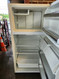 GE 14 CUBIC FOOT REFRIGERATOR TOP FREEZER AUTOMATIC DEFROST ADJUSTABLE WIRE SHELVES 2 CRISPER DRAWERS ALMOND LOCATED IN OUR PORTLAND OREGON APPLIANCE STORE SKU 17852