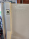 GE 14 CUBIC FOOT REFRIGERATOR TOP FREEZER AUTOMATIC DEFROST ADJUSTABLE WIRE SHELVES 2 CRISPER DRAWERS ALMOND LOCATED IN OUR PORTLAND OREGON APPLIANCE STORE SKU 17852