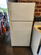 GE 14 CUBIC FOOT REFRIGERATOR TOP FREEZER AUTOMATIC DEFROST ADJUSTABLE WIRE SHELVES 2 CRISPER DRAWERS ALMOND LOCATED IN OUR PORTLAND OREGON APPLIANCE STORE SKU 17852