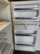 GE 14 CUBIC FOOT REFRIGERATOR TOP FREEZER AUTOMATIC DEFROST ADJUSTABLE WIRE SHELVES 2 CRISPER DRAWERS ALMOND LOCATED IN OUR PORTLAND OREGON APPLIANCE STORE SKU 17852