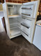 GE 14 CUBIC FOOT REFRIGERATOR TOP FREEZER AUTOMATIC DEFROST ADJUSTABLE WIRE SHELVES 2 CRISPER DRAWERS ALMOND LOCATED IN OUR PORTLAND OREGON APPLIANCE STORE SKU 17852
