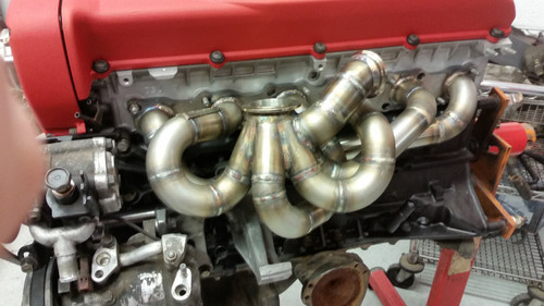 Rb26 single turbo manifold.  45mm TurboSmart wastegate required.  