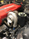 R32 gtr steering resiviour can be retained with V-band and some turbos since turbo can be rotated to suite.