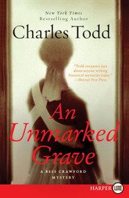 An Unmarked Grave (A Bess Crawford Mystery) by Charles Todd, 9780062128324