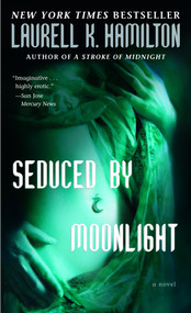 Seduced by Moonlight (A Novel) by Laurell K. Hamilton, 9780345443595