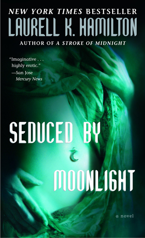 Seduced by Moonlight (A Novel) by Laurell K. Hamilton, 9780345443595
