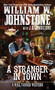 A Stranger in Town by William W. Johnstone, J.A. Johnstone, 9780786039319