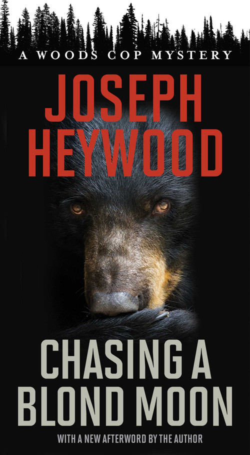 Chasing a Blond Moon (A Woods Cop Mystery) by Joseph Heywood, 9781493059157