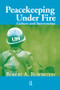Peacekeeping Under Fire (Culture and Intervention) by Robert A. Rubinstein, 9781594515484
