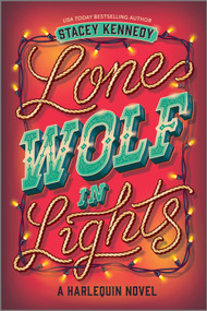 Lone Wolf in Lights (A Spicy Emotional Western Christmas Romance) by Stacey Kennedy, 9781335574855