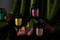 APOTHECARY NOIR 8 OZ BLACK GLASS VESSEL & LID WITH MAROON LABEL - LINEN & ORRIS, APN805