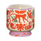 A DOPO 8 OZ HANDPAINTED "JUNGLE" CERAMIC CANDLE - COCONUT & AMBER, AD0809