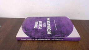 Global politics in the information age by Mark J. Lacy, Peter Wilkin, 9780719067945