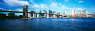 Brooklyn Bridge Across East River Clouds