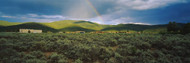 Rainbow Over Rolling Landscape Taos