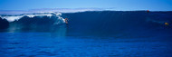Surfers in the Sea Tahiti French Polynesia