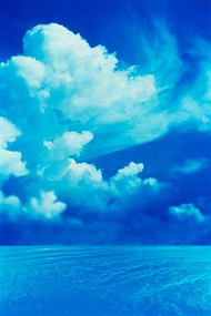 White Clouds Over Blue Sea