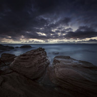 Huge Rocks On The Shore Of A Sea And Stormy Clouds Sardinia Italy