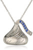 The Hershey's Kiss is an iconic sign of Love. Designed in Sterling Silver , this Medium Flat Back Hershey's Kiss Pendant with diamond accent (Color: H-I, Clarity: I2) shines as an expression of Love. The Kiss measures 15MM in height and 6MM at the base. 18 inch (16 inch with a 2 inch extension) sterling silver cable chain w/ spring lock. Included in this bundle you will also receive a Hershey's Kisses chocolate tin (Chocolate Included) as well as the official Hershey's Kiss Jewelry packaging. Give your loved one jewelry and chocolate this Valentine's Day.