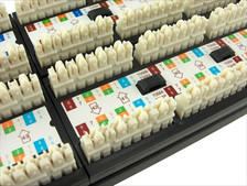 back of a 48 port cat5e patch panel