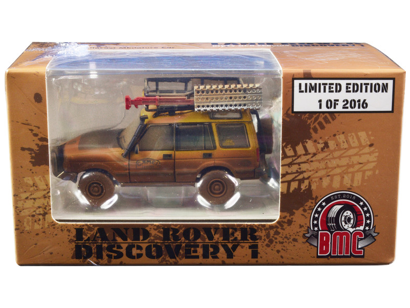 Land Rover Discovery 1 RHD Right Hand Drive Camel Trophy Yellow Dirty Mud Version with Roof Rack Extra Wheels and Accessories Limited Edition to 2016 pieces Worldwide 1/64 Diecast Model Car BM Creations 64B0282