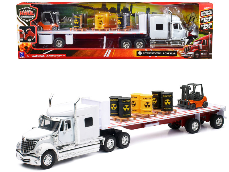 International Lonestar Flatbed Truck White with 6 Toxic Barrels 3 Pallets and Forklift Long Haul Trucker Series 1/32 Diecast Model New Ray 10193B