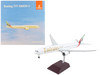 Boeing 777 300ER Commercial Aircraft with Flaps Down Emirates Airlines 2023 Livery White with Striped Tail Gemini 200 Series 1/200 Diecast Model Airplane GeminiJets G2UAE1250F