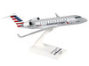 Bombardier CRJ200 Commercial Aircraft American Eagle N405AW Gray with Blue and Red Tail Snap Fit 1/100 Plastic Model Skymarks SKR858
