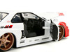 2002 Nissan Skyline GT R R34 RHD Right Hand Drive White with Red Graphics and Ryu Diecast Figure Street Fighter Video Game Anime Hollywood Rides Series 1/24 Diecast Model Car Jada 35114