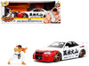 2002 Nissan Skyline GT R R34 RHD Right Hand Drive White with Red Graphics and Ryu Diecast Figure Street Fighter Video Game Anime Hollywood Rides Series 1/24 Diecast Model Car Jada 35114