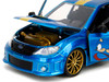 2012 Subaru Impreza WRX STI Blue Metallic with Graphics and Sonic The Hedgehog Diecast Figure Sonic The Hedgehog Hollywood Rides Series 1/24 Diecast Model Car Jada 35871