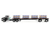 Mack Pinnacle Day Cab with Minimizer Parts & 53 Wilson Roadbrute Flatbed Trailer with Carlisle Roofing Loaded Pallets Black with Silver Top and Stripes 1/64 Diecast Model DCP/First Gear 60-1954