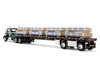 Mack Pinnacle Day Cab with Minimizer Parts & 53 Wilson Roadbrute Flatbed Trailer with Carlisle Roofing Loaded Pallets Black with Silver Top and Stripes 1/64 Diecast Model DCP/First Gear 60-1954