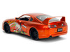1995 Toyota Supra Orange Metallic with Graphics and Chainsaw Man Diecast Figure Chainsaw Man 2022 TV Series Anime Hollywood Rides Series 1/24 Diecast Model Jada 35181