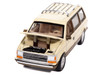 1987 Plymouth Voyager Van Light Cream and Golden Bronze Metallic 2 Tone Mighty Minivans Series 1/64 Diecast Model Car Auto World 64512-AWSP197B 1987 Plymouth Voyager Van Light Cream and Golden Bronze Metallic 2 Tone Mighty Minivans Series 1/64 Diecast Model Car Auto World 64512-AWSP197B