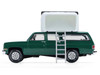 1990 Chevrolet Suburban Green with Modern Rooftop Camper The Great Outdoors Series 4 1/64 Diecast Model Car Greenlight 38080E