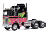 1976 Kenworth K100 Aerodyne Truck Tractor Black and Pink with Graphics 1/64 Diecast Model IXO Models U64TR006