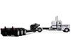 Peterbilt 389 with 36 Flat Top Sleeper and Fontaine Magnitude Lowboy Trailer White with Black Stripes 1/64 Diecast Model DCP/First Gear 60-2191