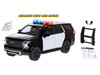2025 Chevrolet Tahoe PPV Black and White Builder s Kit with Flashing Light Bar and Front and Rear Lights and Sounds 1/24 Diecast Model Car Motormax 79623BKW