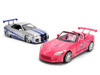 Brian's Nissan Skyline GT-R (R34) Silver Metallic with Blue Stripes and Suki's Honda S2000 Pink with Graphics Set of 2 Cars Fast & Furious 25th Anniversary Fast & Furious Series 1/24 Diecast Model Cars Jada 37543