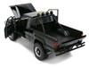 1985 Toyota SR5 Pickup Truck Black with Marty's Skateboard Back to the Future 1985 Movie Hollywood Rides Series 1/24 Diecast Model Car Jada 36479