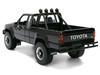 1985 Toyota SR5 Pickup Truck Black with Marty's Skateboard Back to the Future 1985 Movie Hollywood Rides Series 1/24 Diecast Model Car Jada 36479